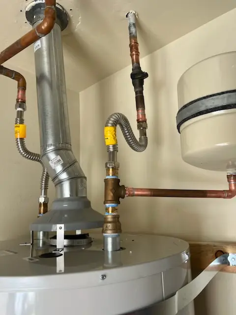 Water heater installation and plumbing repair in Hemlock